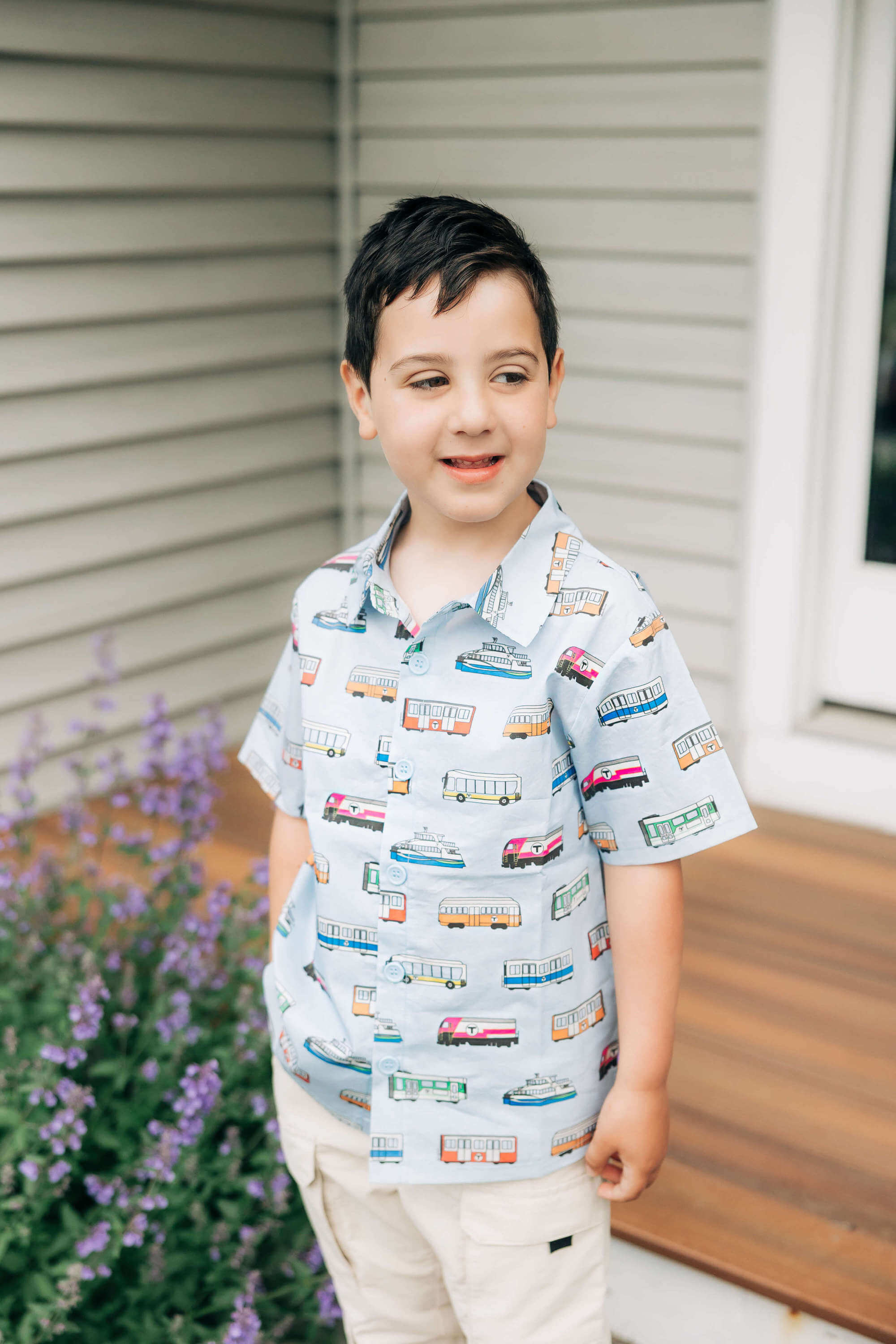 Boy wearing fun Boston MBTA light blue button-up party shirt